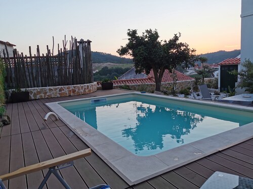 In the heart of the medieval town next to Penela Castle. 