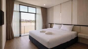 Superior Double Room, River View | Hypo-allergenic bedding, desk, iron/ironing board, free WiFi