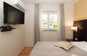 Appartement Exécutif, plusieurs lits, réfrigérateur et four à micro-ondes (Marina - 700 Rose M)