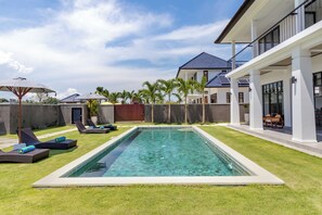 Outdoor pool, pool umbrellas, pool loungers