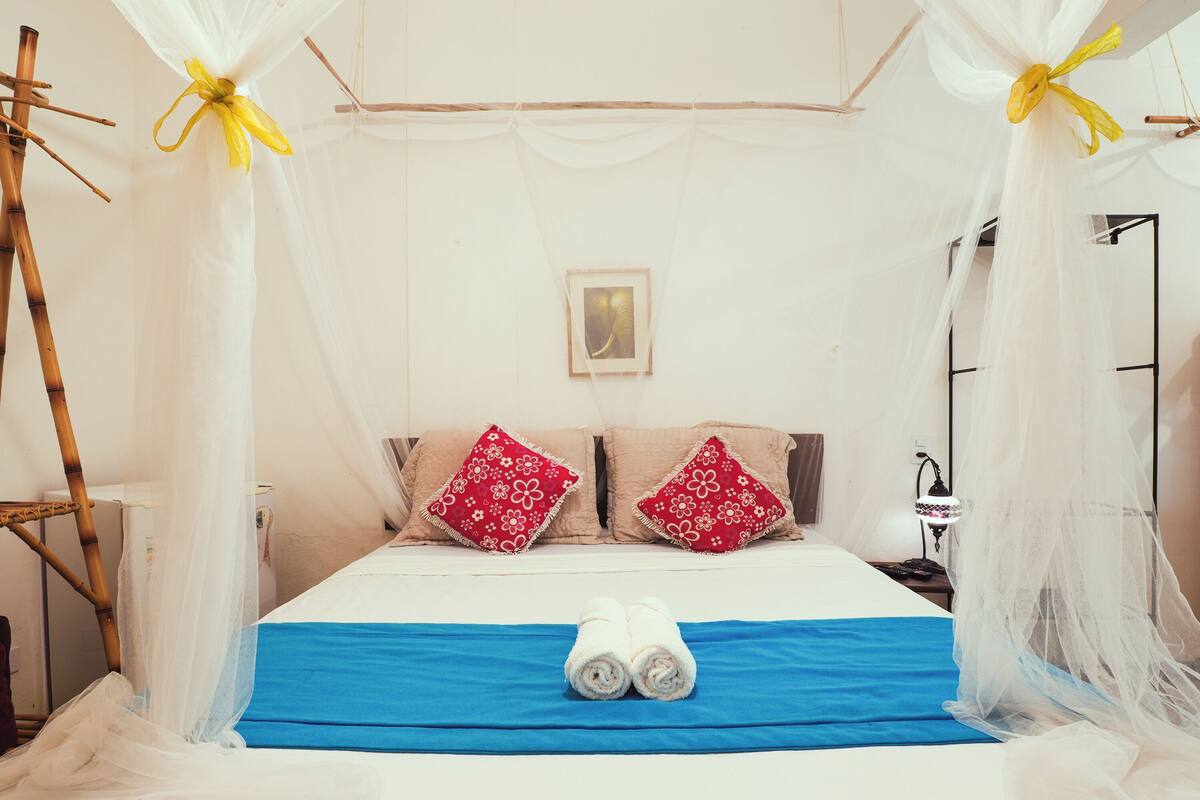 Familienzimmer | Minibar, kostenloses WLAN, Bettwäsche