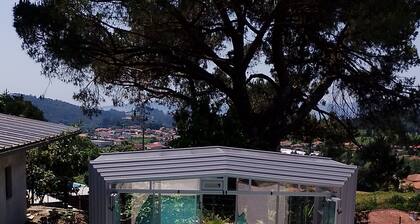 Logement dans maison avec piscine partagée, 10mn de Braga. Location a la semaine