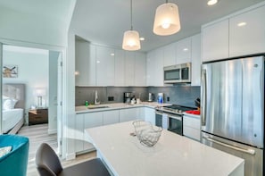 Coffee/tea maker, fridge, microwave, oven