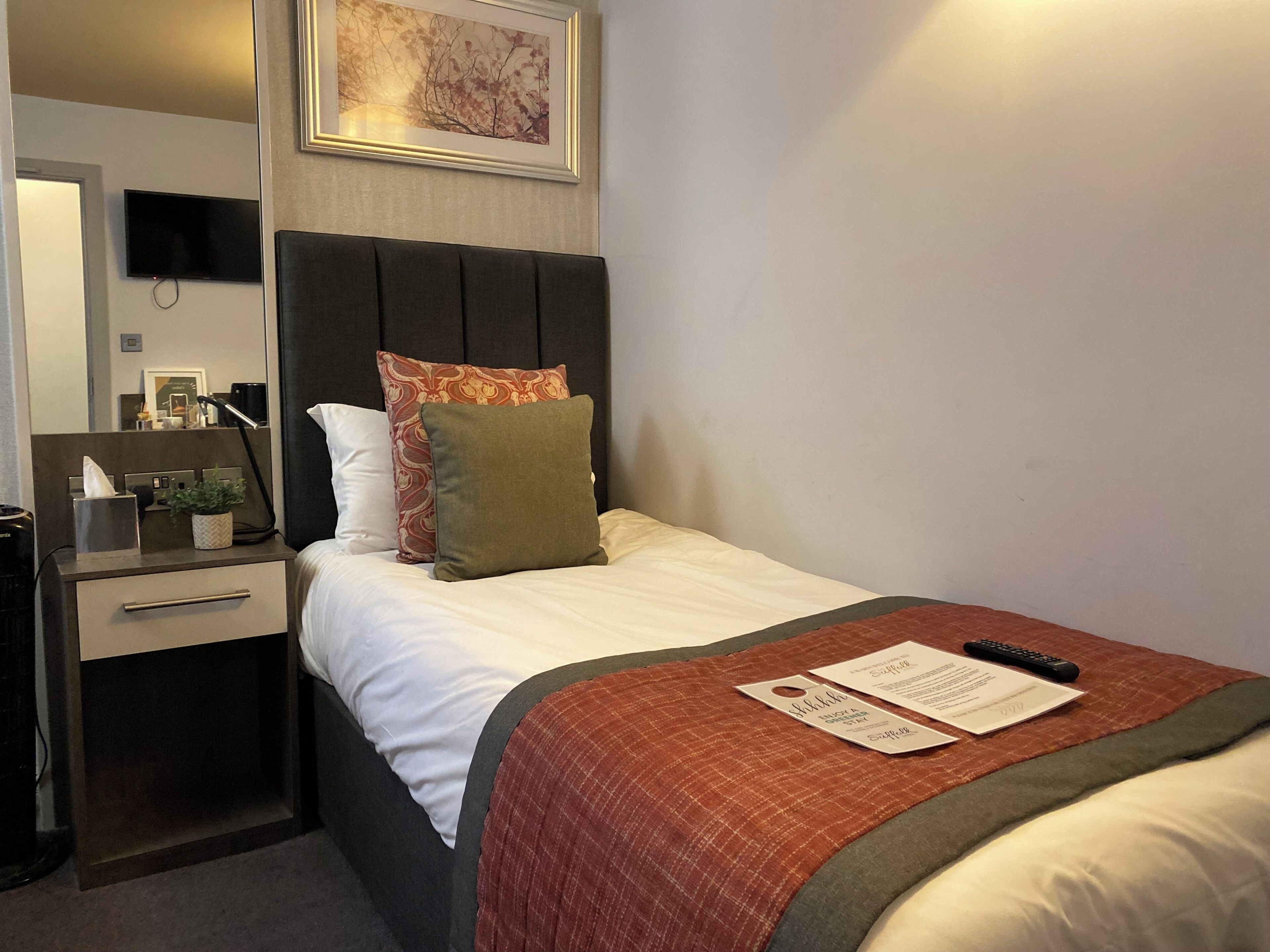 Premium bedding, memory-foam beds, in-room safe, laptop workspace