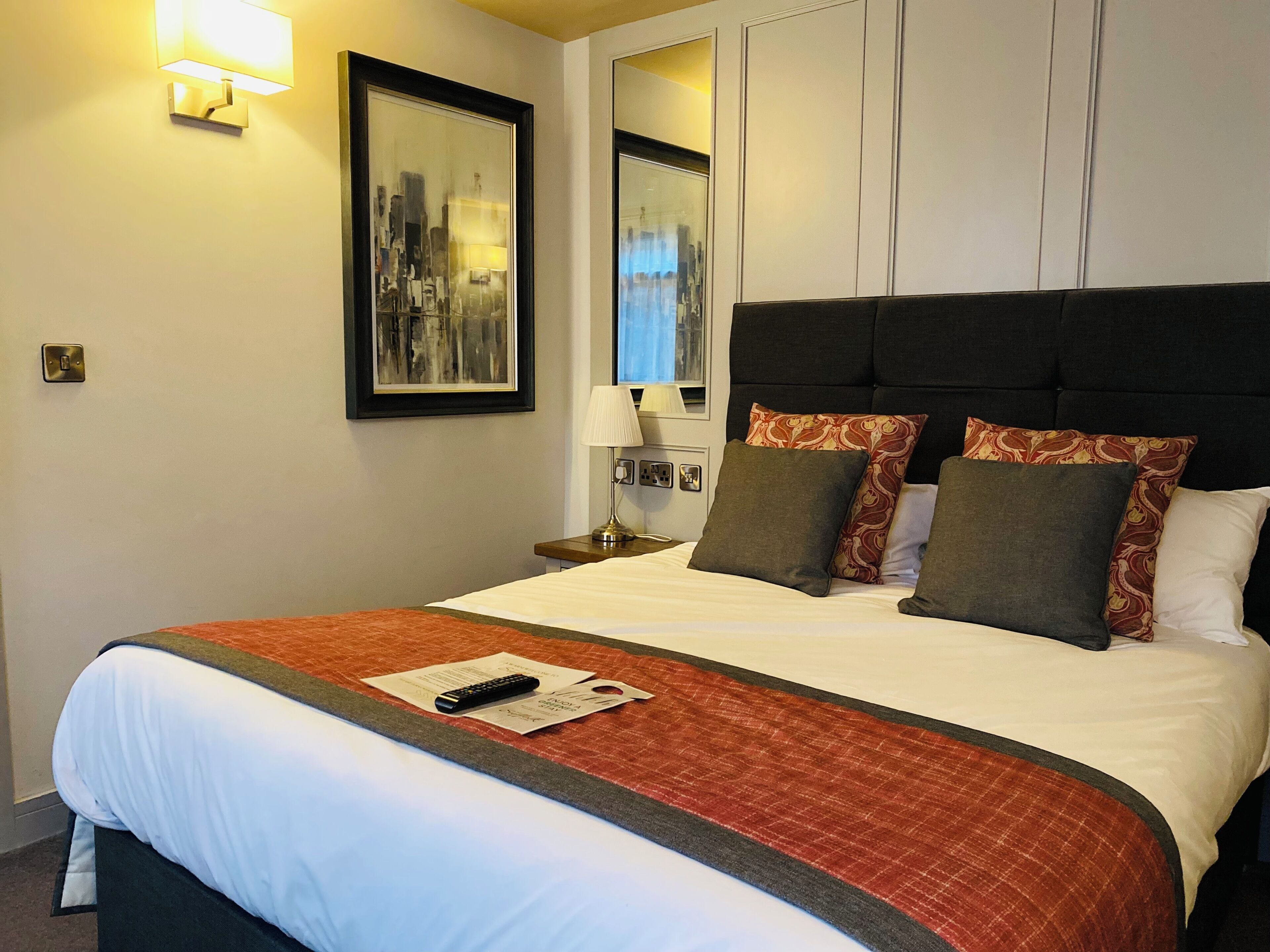 Premium bedding, memory-foam beds, in-room safe, laptop workspace