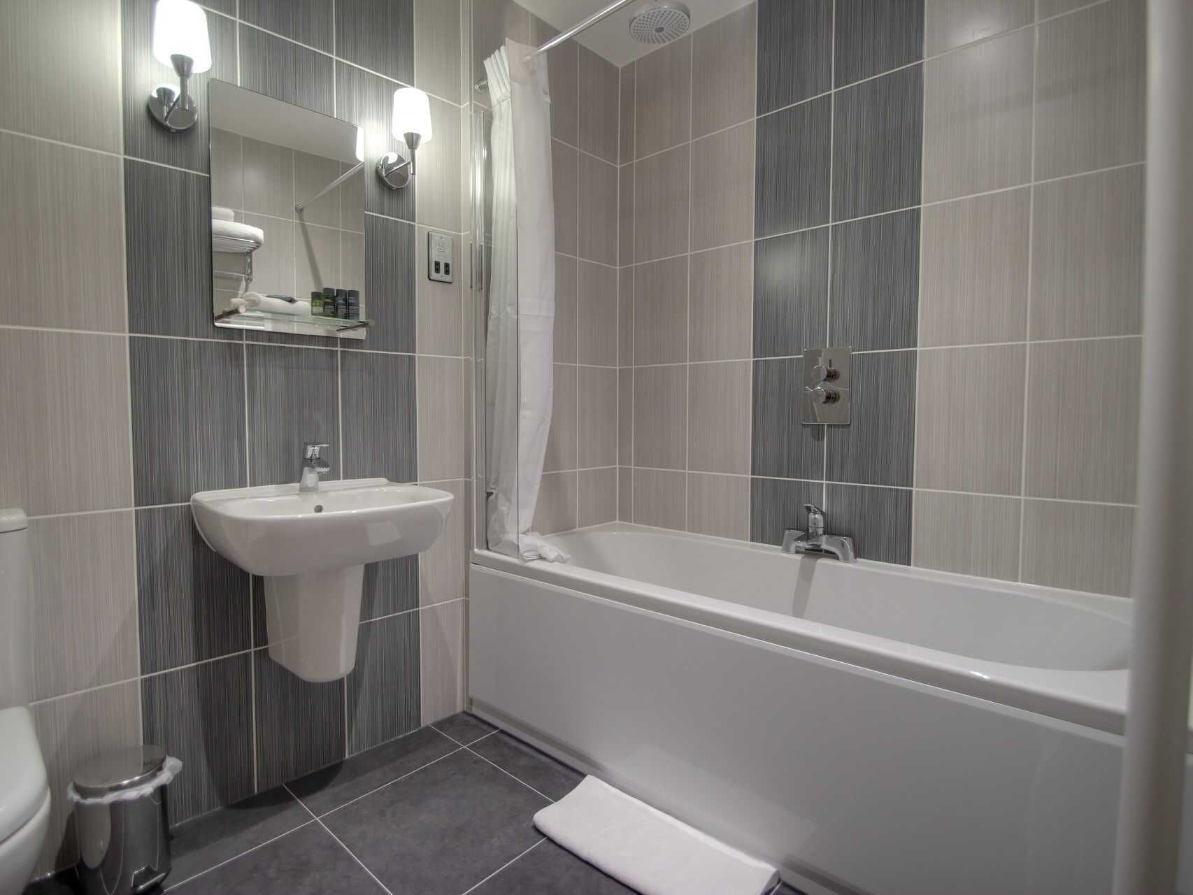 King Suite | Bathroom | Hair dryer, towels, soap, shampoo