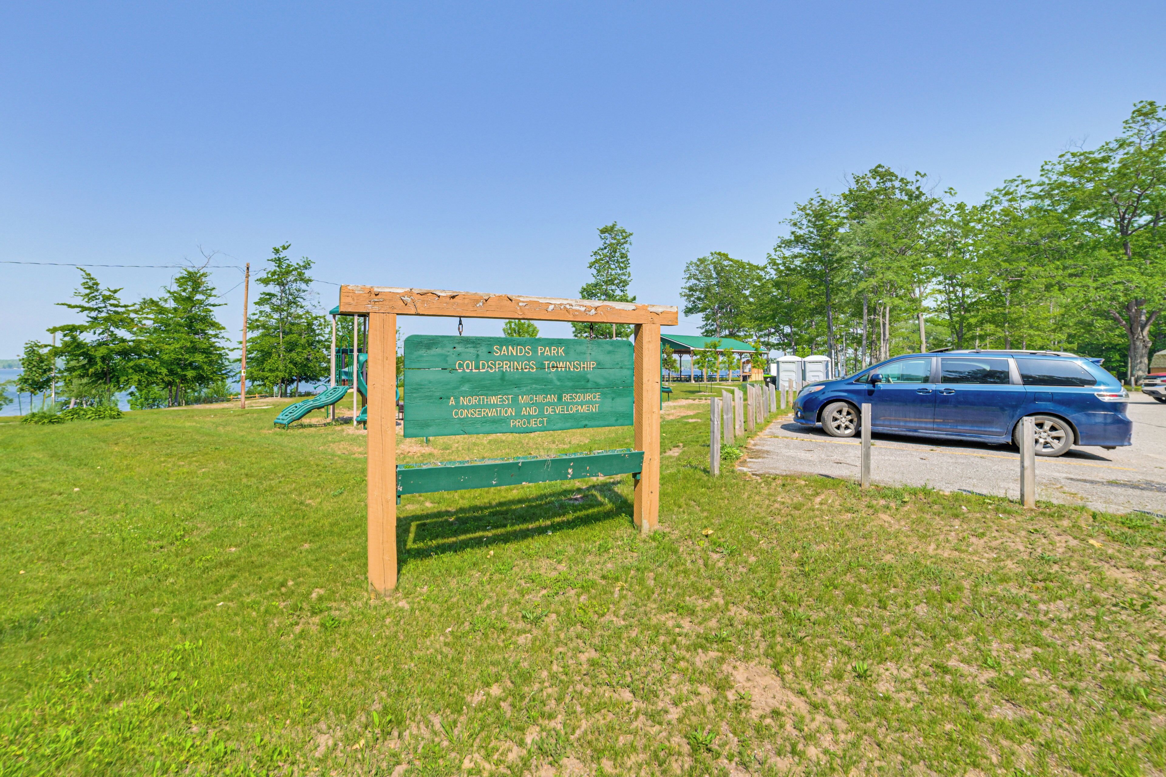 A sign for Sands Park in Cold Springs Township, indicating it is a Northwest Michigan resource conservation and development project.