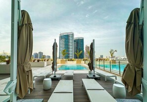 Pool - Modern 1BR in Binghatti Luna, JVC by Deluxe Holiday Homes (Dubai)