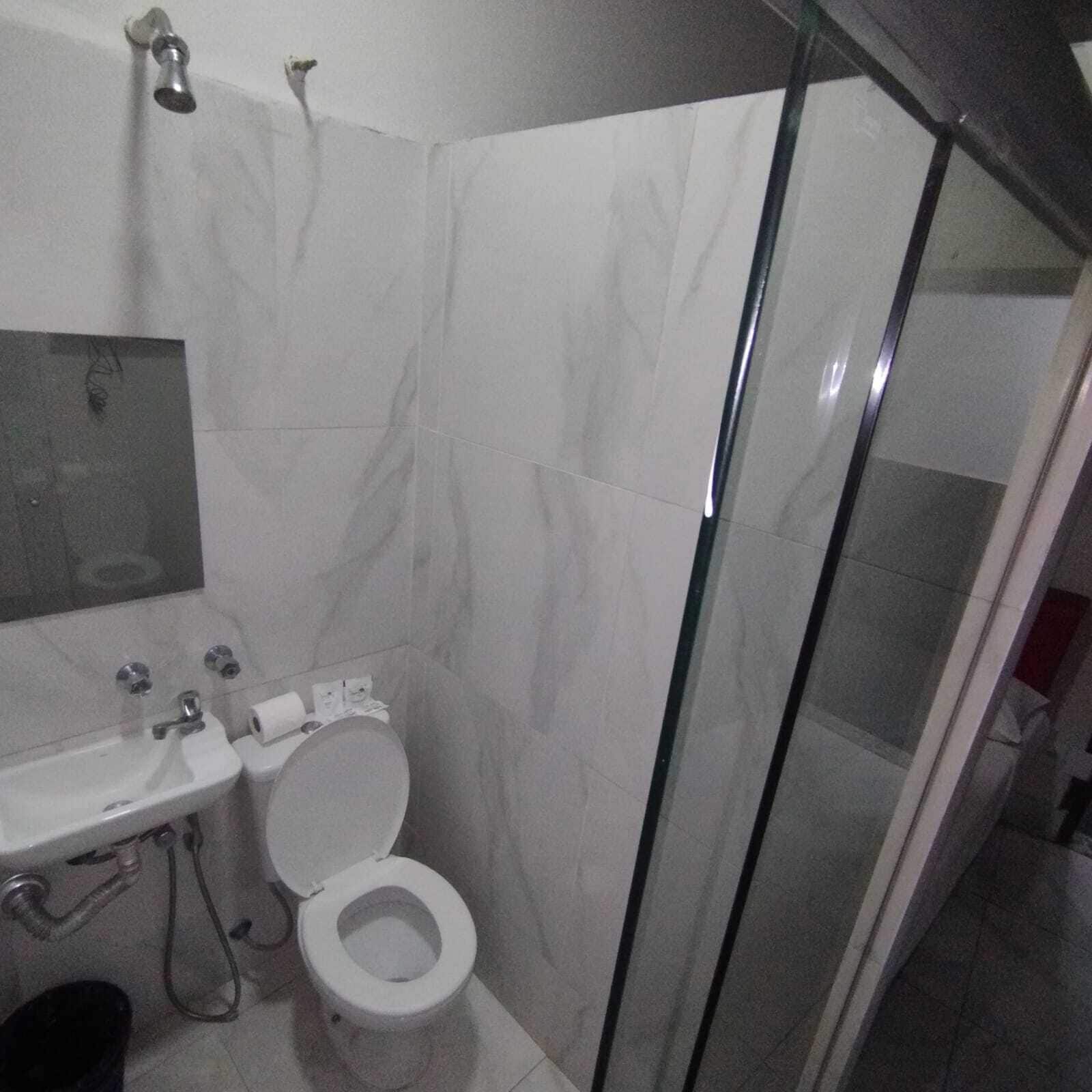 Habitación doble económica | Baño | Regadera 