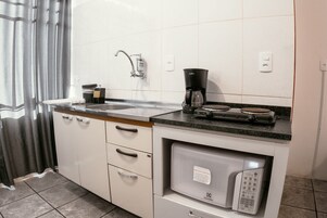 Studio | Private kitchen | Fridge, microwave, stovetop, cookware/dishes/utensils