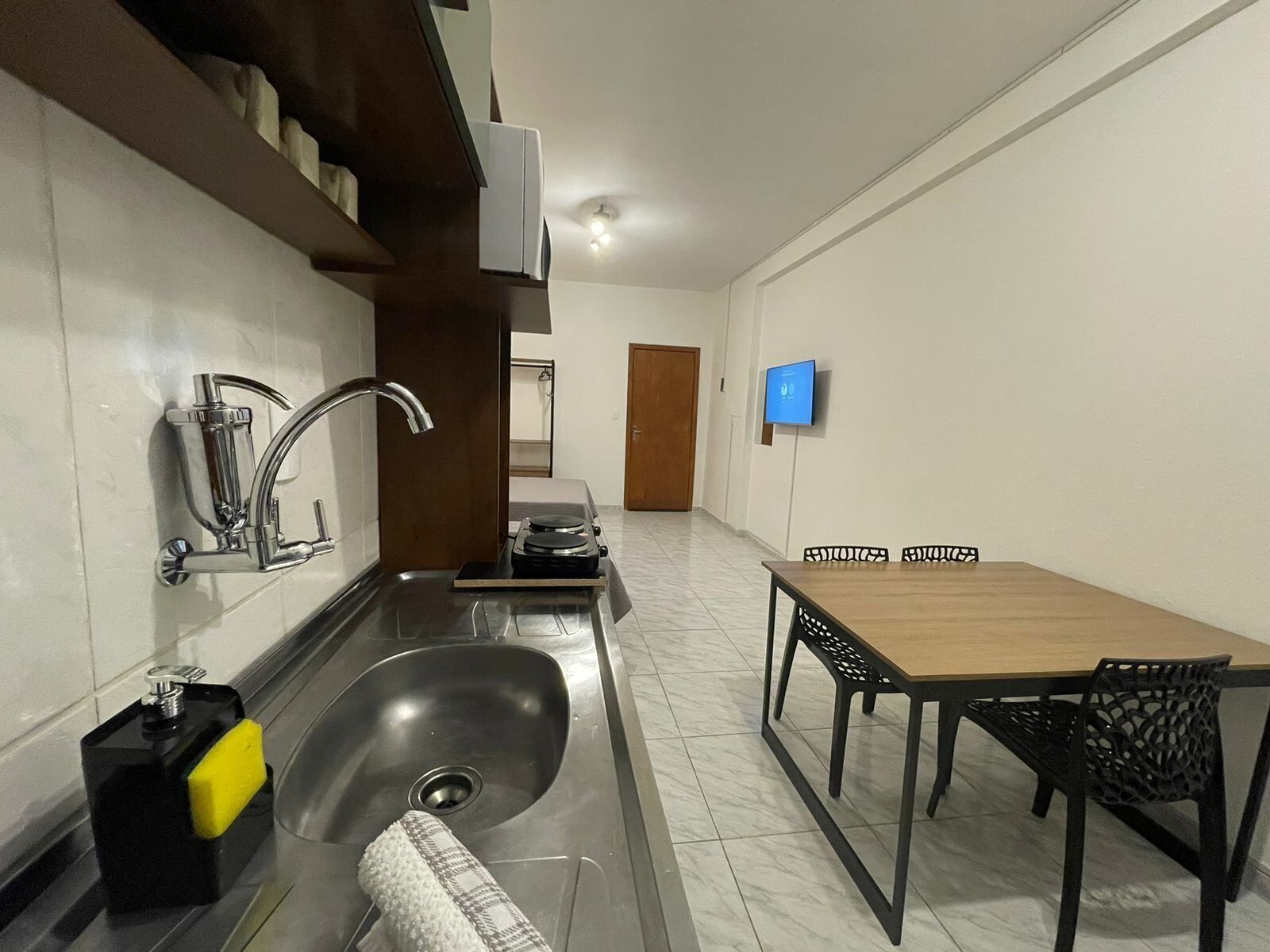 Apartment | Private kitchen | Fridge, microwave, stovetop, cookware/dishes/utensils