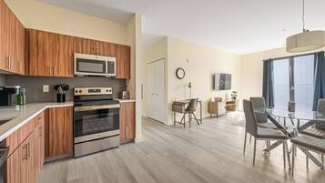 Coffee/tea maker, fridge, microwave, oven
