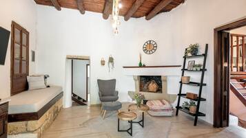 Comfort Villa, Mountain View | Living area | 50-inch Smart TV with cable channels