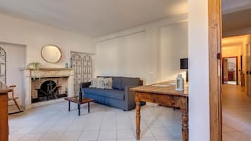 Apartment, 3 Bedrooms | Living area | 40-inch flat-screen TV with digital channels