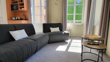 Suite Deluxe, vue ville | Coin séjour