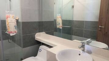 Hair dryer, towels, soap, shampoo