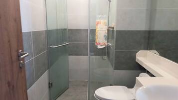Hair dryer, towels, soap, shampoo