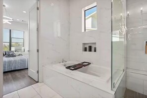 Shower, hair dryer, towels, soap