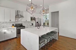 Fridge, coffee/tea maker, electric kettle, high chair