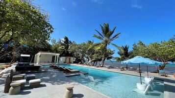 Outdoor pool, open 6:00 AM to 9:00 PM, pool umbrellas, pool loungers