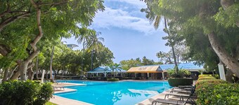 Coastal condo with stunning sea views, rain shower & private balcony escape