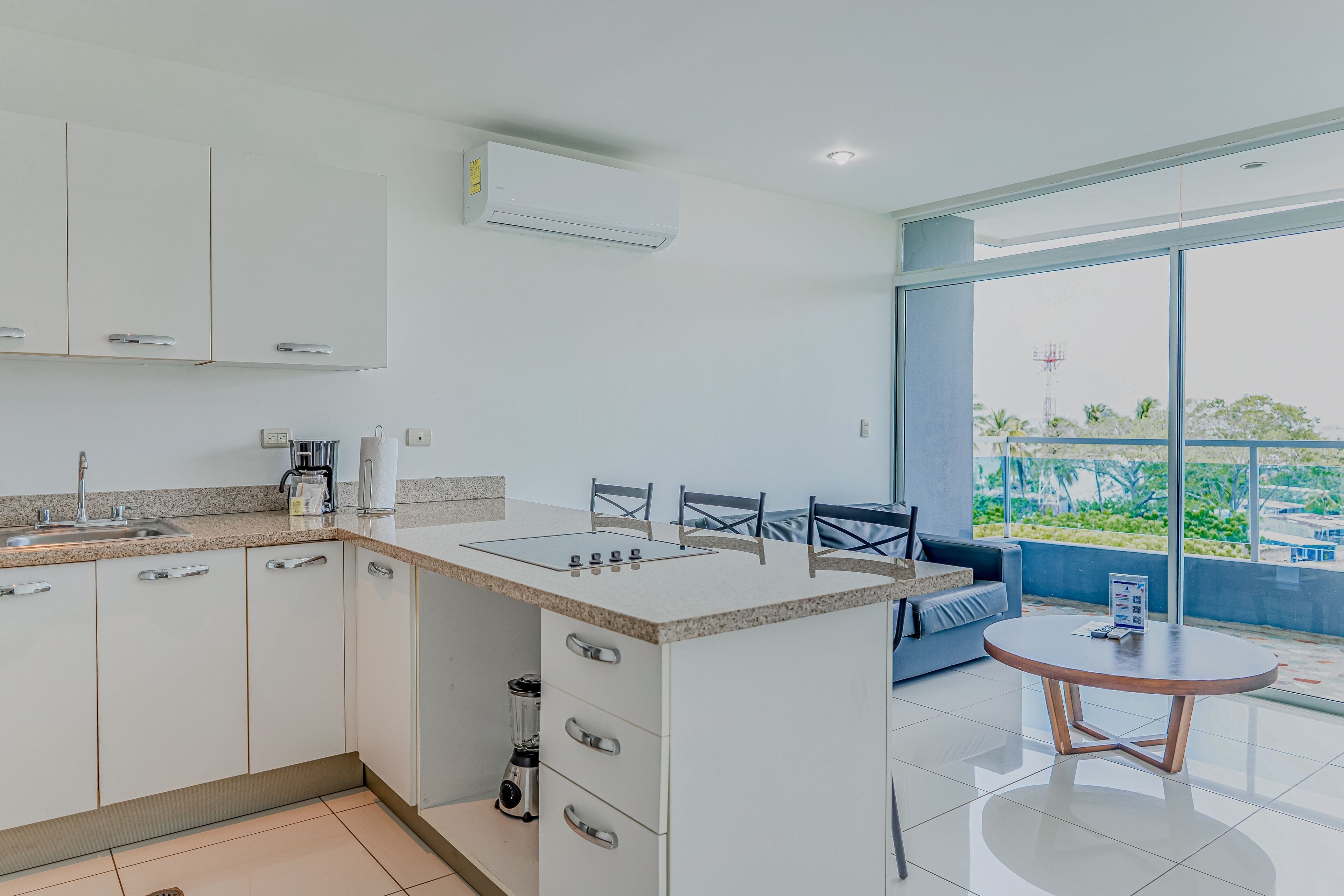 Fridge, microwave, stovetop, coffee/tea maker