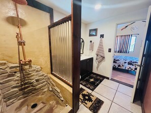 Shower, towels, soap, toilet paper