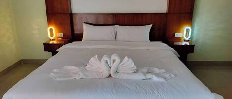 Deluxe Room, 1 King Bed, Balcony | Free WiFi, bed sheets