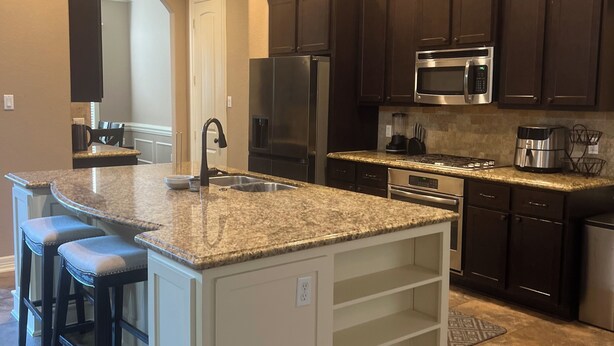 Unclassified image, 1 of 28, button - 4-bedroom house in enchanting Houston with WiFi, AC, Barbecue Unwind in style. (Houston)
