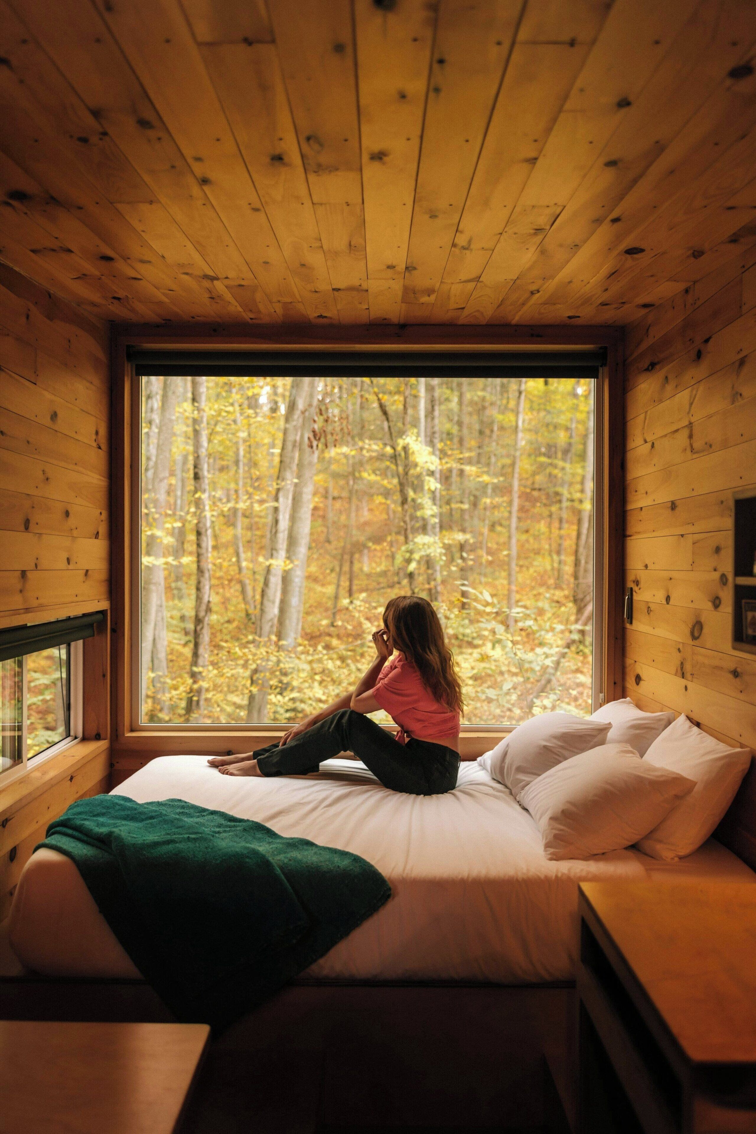 Desk, laptop workspace, bed sheets