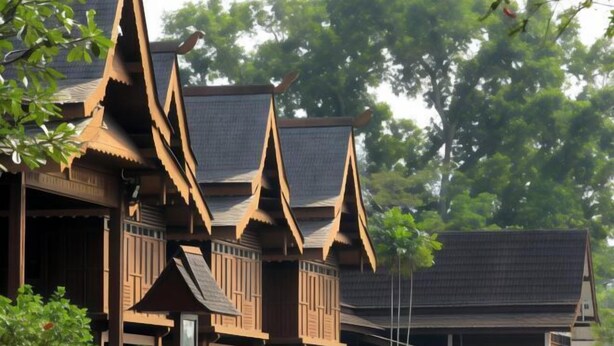 A traditional wooden building with multiple levels and steeply pitched roofs. - Grand Flora Hotel (Melaka)