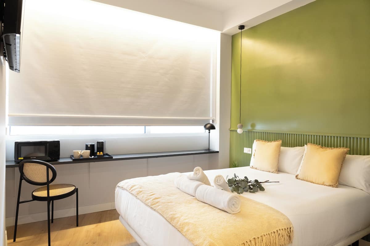In-room safe, desk, laptop workspace, iron/ironing board
