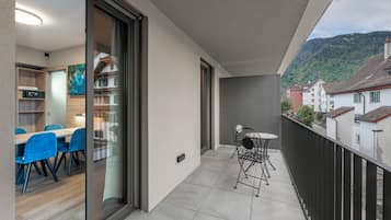 Superior Quadruple Room, Kitchen, Courtyard View | Terrace/patio