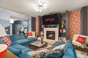 Smart TV, fireplace, video games, table football
