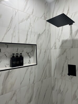 Shower, hair dryer, towels, soap