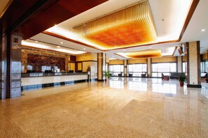 A spacious lobby with a reception desk, seating area, and large windows. - Imperial Hotel Miri (Miri)