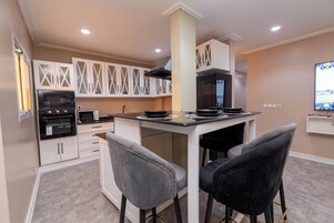 Apartment, Pool View | In-room dining