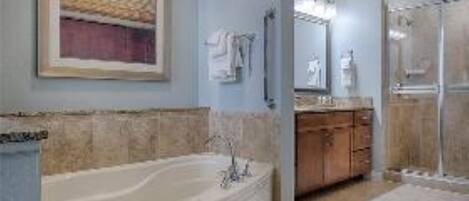 Jetted bath, hair dryer, towels, soap