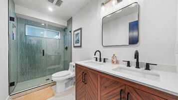 Hair dryer, towels, soap, shampoo