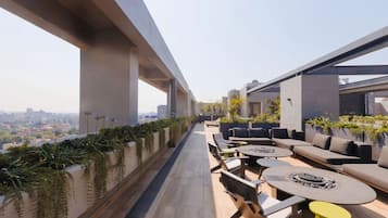 Departamento de lujo, vista a la ciudad | Área de sala de estar