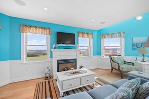 Smart TV, fireplace, books