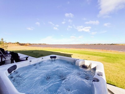 Stunning Riverside Escape with River Access