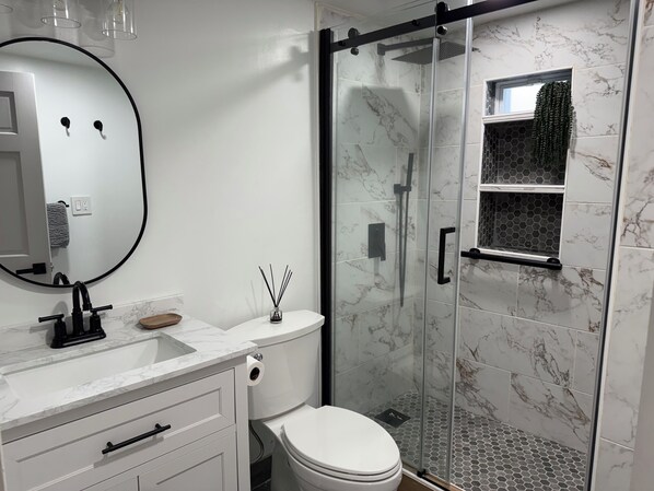 Hair dryer, bidet, towels, soap