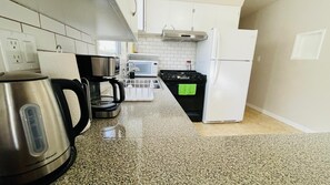 Microwave, oven, stovetop, high chair - Beautiful & Bright 03 Bedrooms on the main floor. (Regina)
