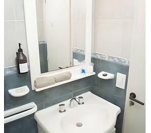 Hair dryer, towels, soap, shampoo
