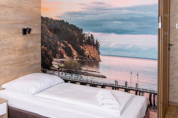 Memory-foam beds, desk, laptop workspace, blackout curtains