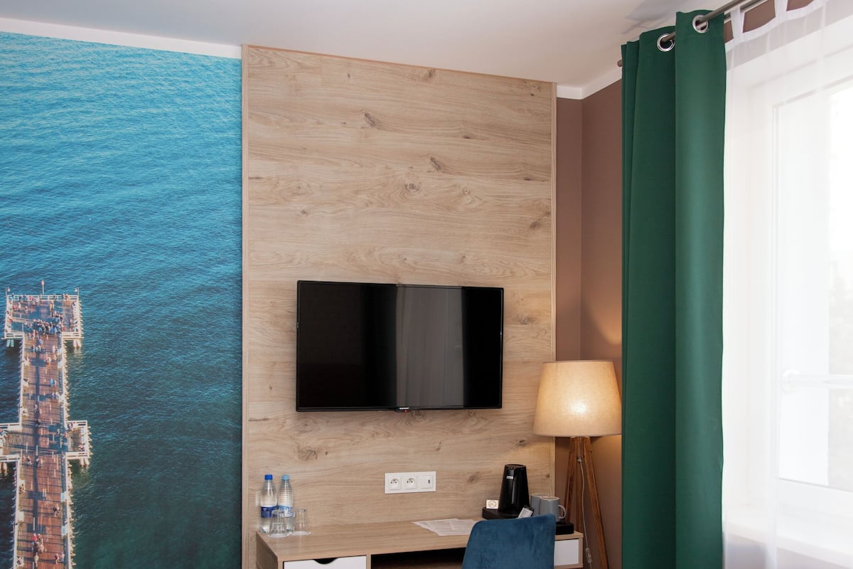Standard Room | Memory-foam beds, desk, laptop workspace, blackout curtains
