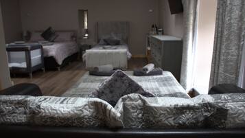 Family Quadruple Room, Multiple Beds, Private Bathroom | Iron/ironing board, free WiFi