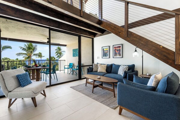 TV, books - 🏖️Fully Air-Conditioned | Updated Top Floor Including Loft | Ocean Views (Kailua Kona)