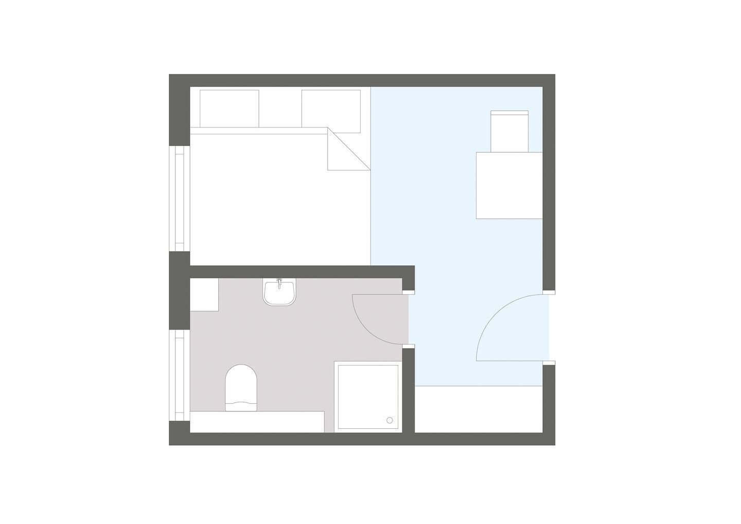 Een plattegrond met een slaapkamer, badkamer en kitchenette.